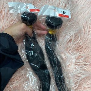 Two bundles of Human Hair Color 1B 16 and 18 inches 100g each